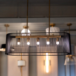 Люстра подвесная овальной формы с металлическим решетчатым абажуром матово-черного цвета и 5 лампами Kichler варинант исполнения - 7 | Loft Concept в Липецке